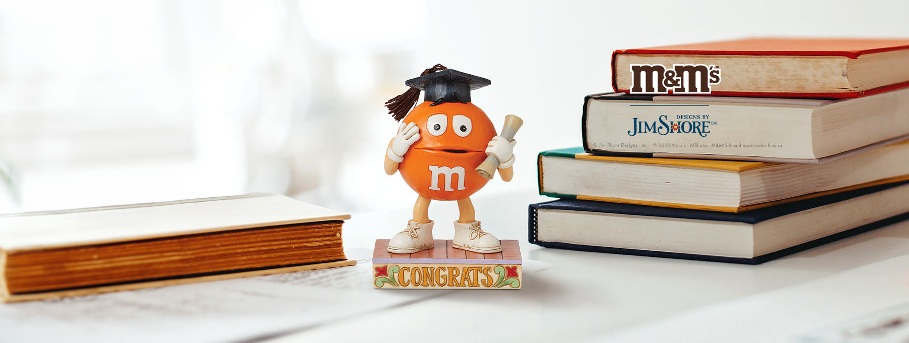 Jim Shore M&M's Graduation figurine
