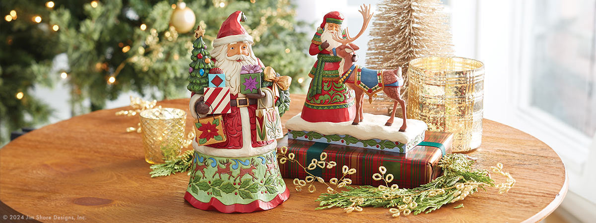 Jim Shore Christmas Santa and Mrs figurines