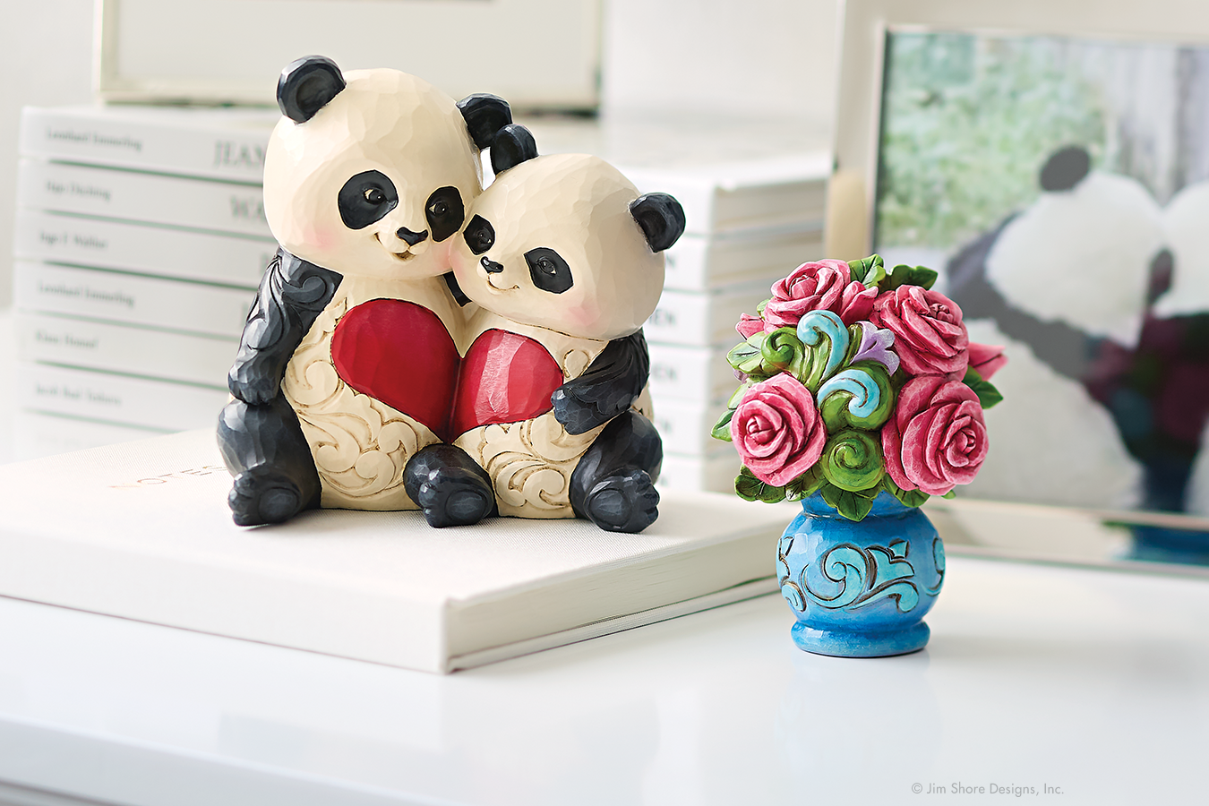 Pandas with heart figurine 