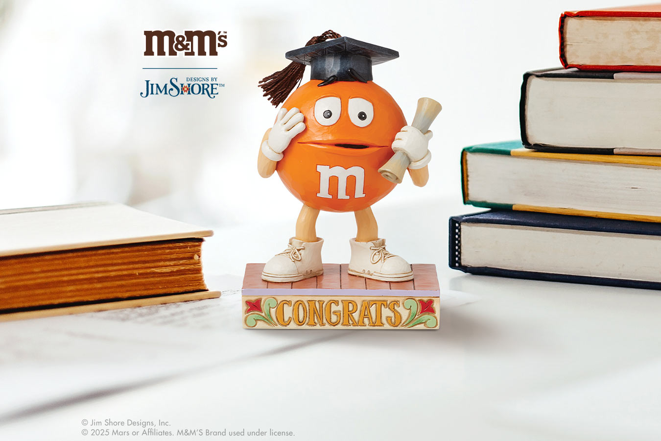 Jim Shore M&M's Orange Graduation figurine