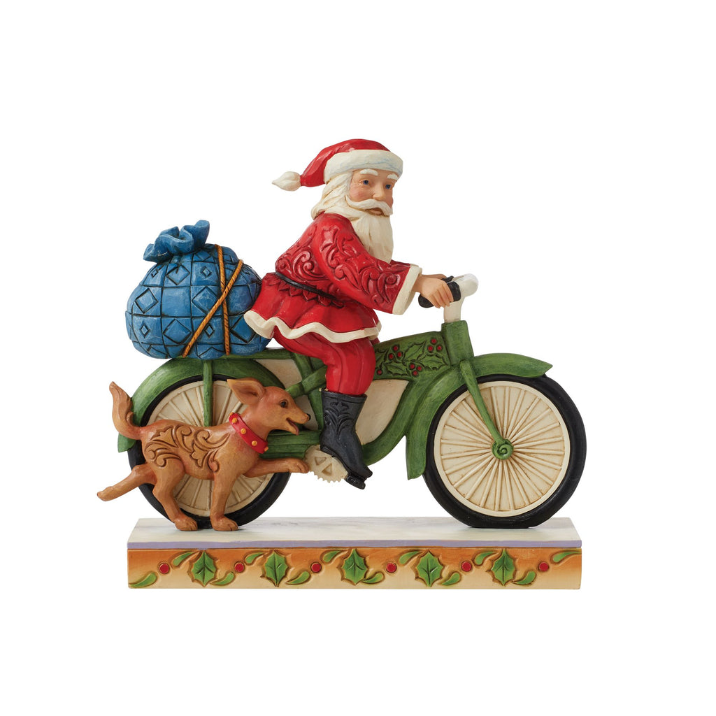 Santa Riding Bicycle – Jim Shore