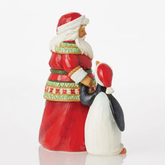 Pint Sized Santa with Penguin