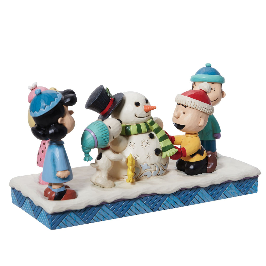 Peanuts Gang Building Snowman