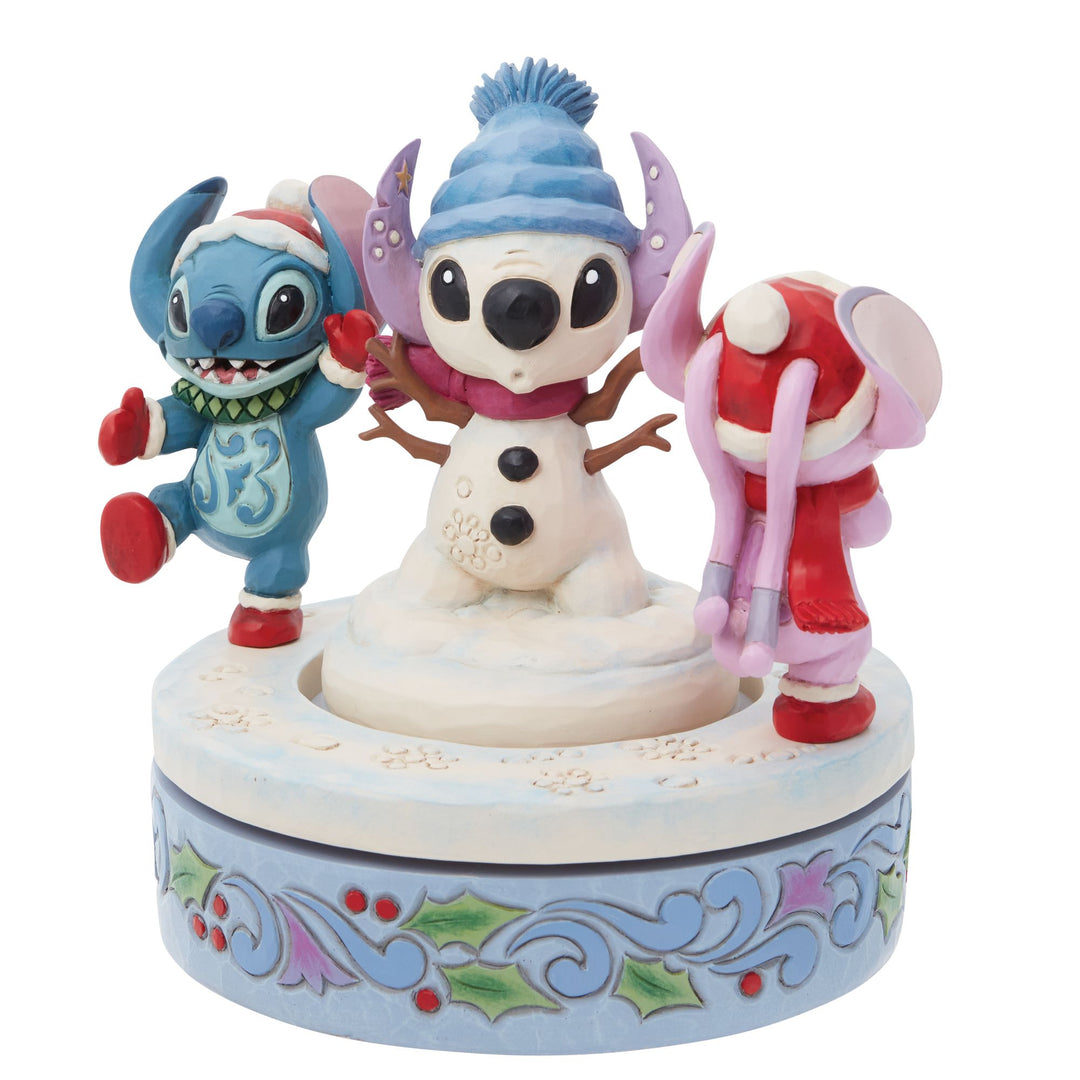 Stitch & Angel Building a Snow