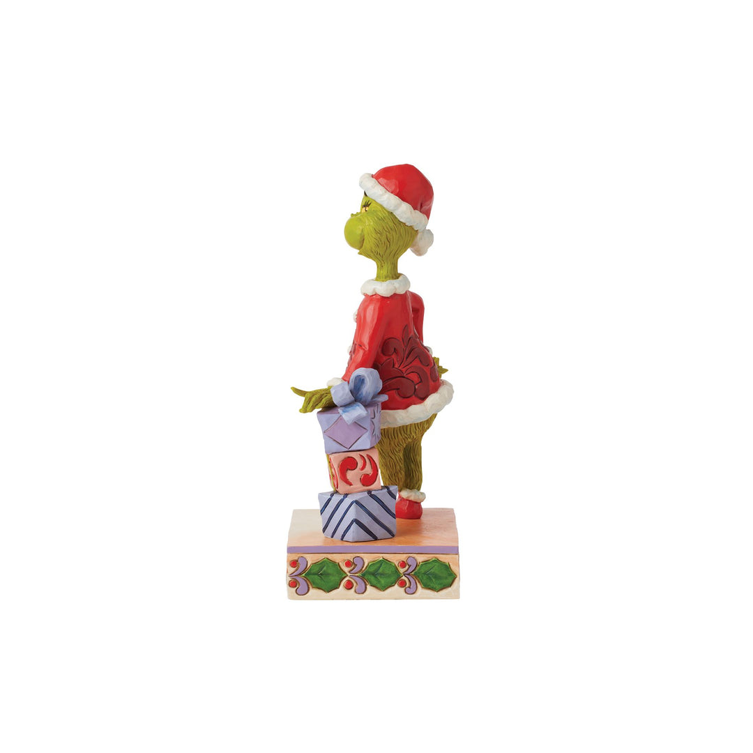 Grinch Leaning on Gifts