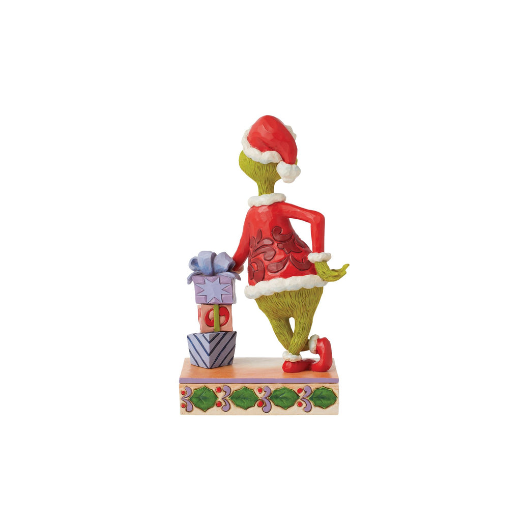 Grinch Leaning on Gifts