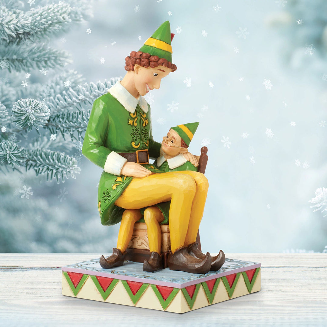 Buddy Elf Sitting on Papa Elf