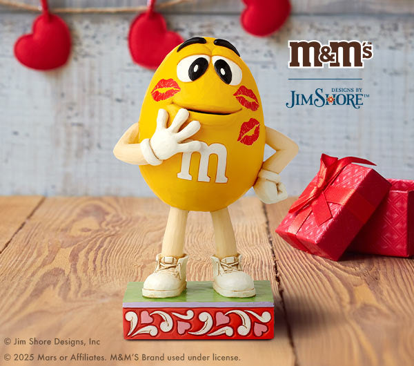 M&M's figurine with kisses on face