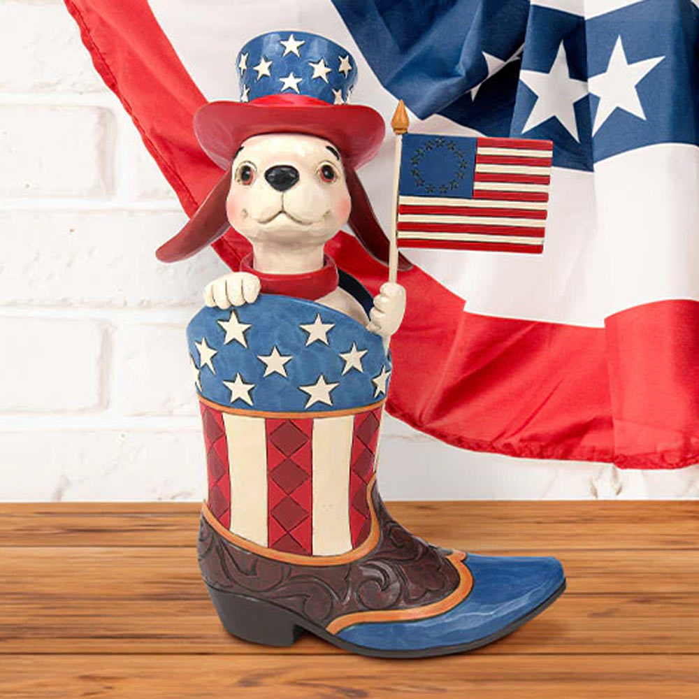 dog in cowboy boot holding flag 
figurine