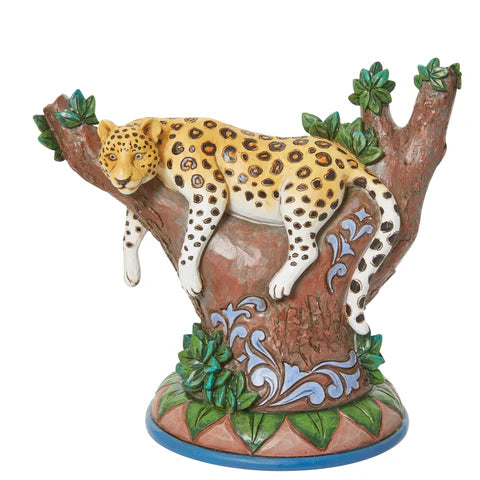 Leopard in tree figurine