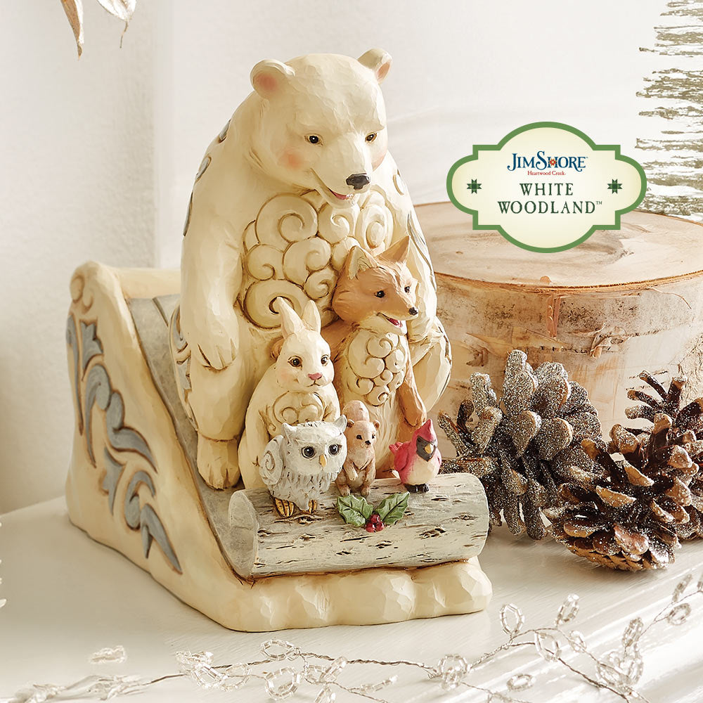 Forest animals on sled figurine